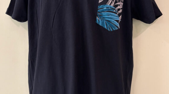 Keawe black on a black tee